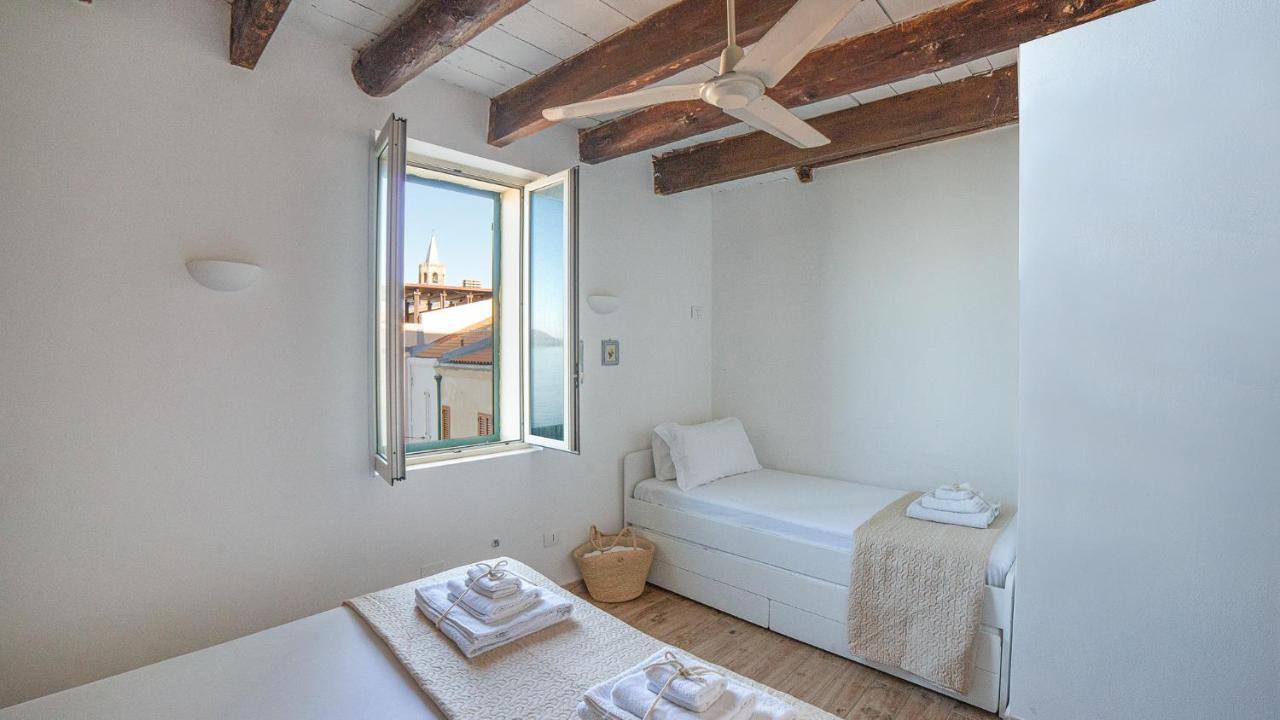 Waterfront Apartment Alghero Bagian luar foto