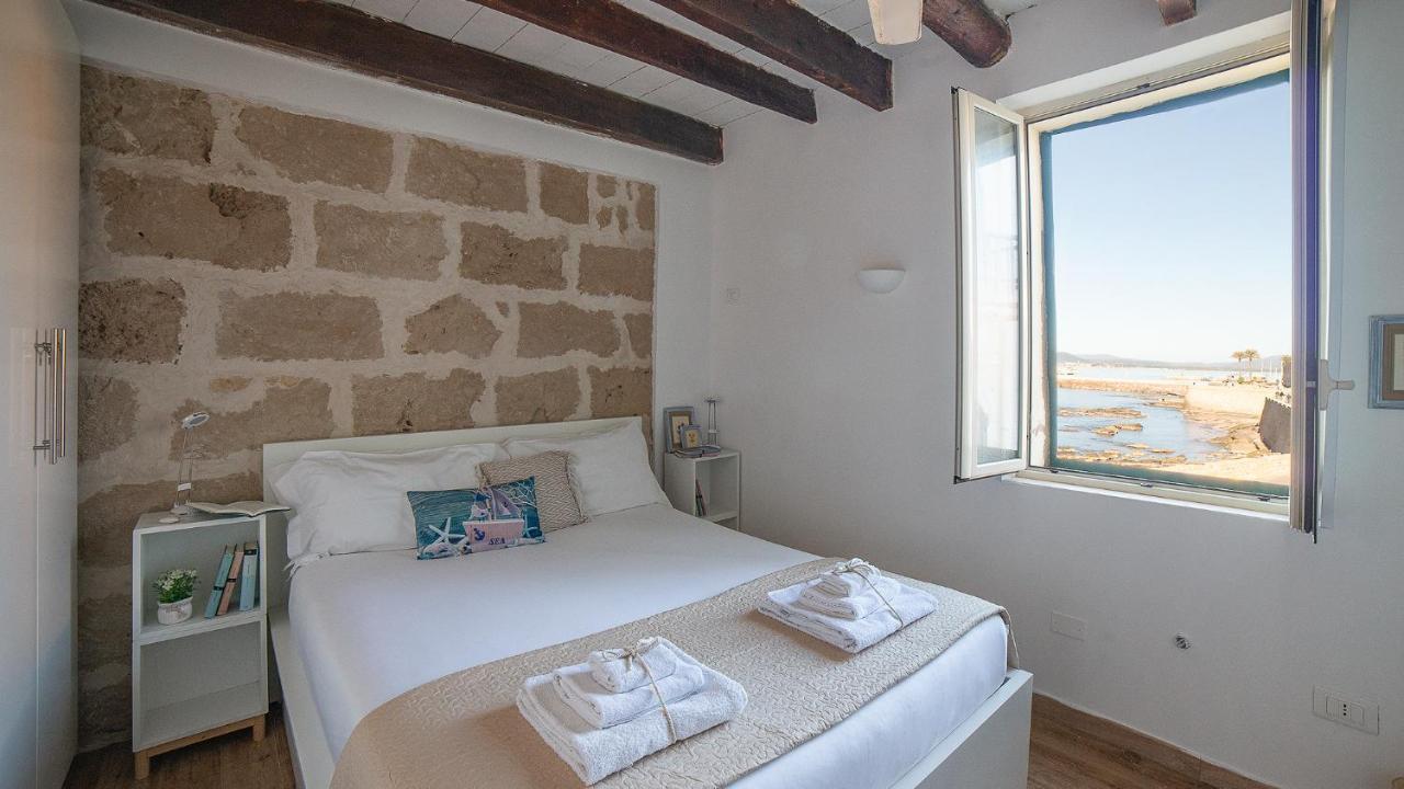 Waterfront Apartment Alghero Bagian luar foto
